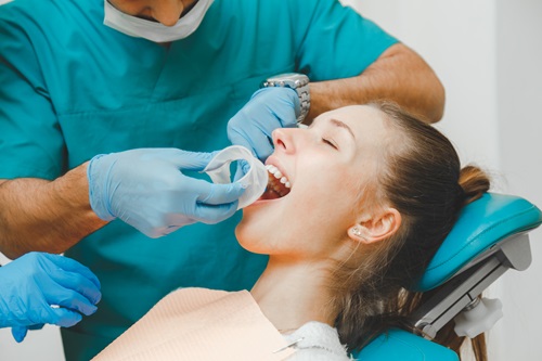 woman having wisdom tooth extraction