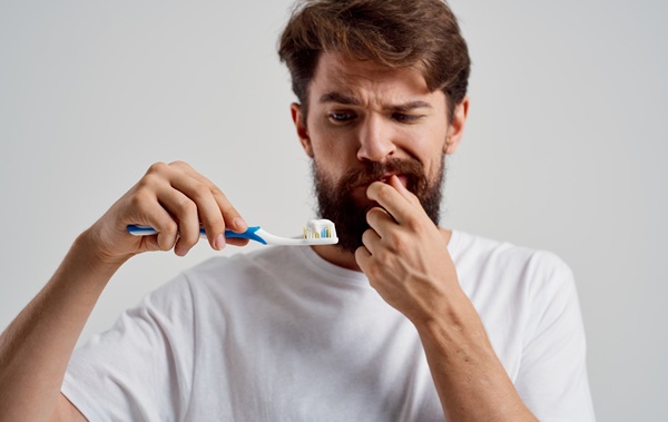 emotional man dental care dentistry toothache after extraction