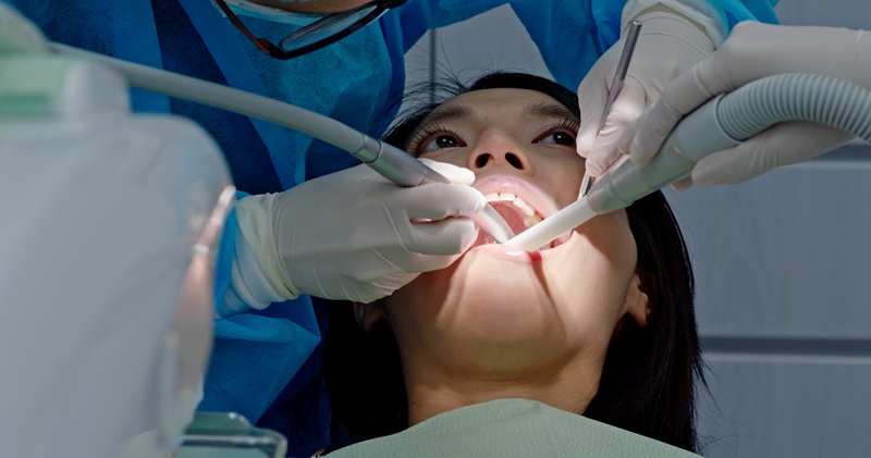 Woman having professional dental cleanign